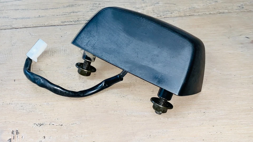 Interruptor de manija de liberación de ventana de vidrio puerta levadiza Mitsubishi Endeavor 2004-2008 OEM Foto 2 de 2