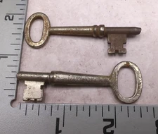 Two mortise skeleton keys   One is Yale & Towne and the other is unmarked