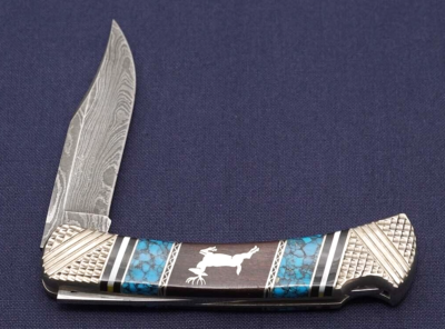 BUCK 110Y2 Custom Yellow Horse Damascus Limited Deer Holding BUCK 110Y2 Custom Yellow Horse Damascus Limited Deer Holding
