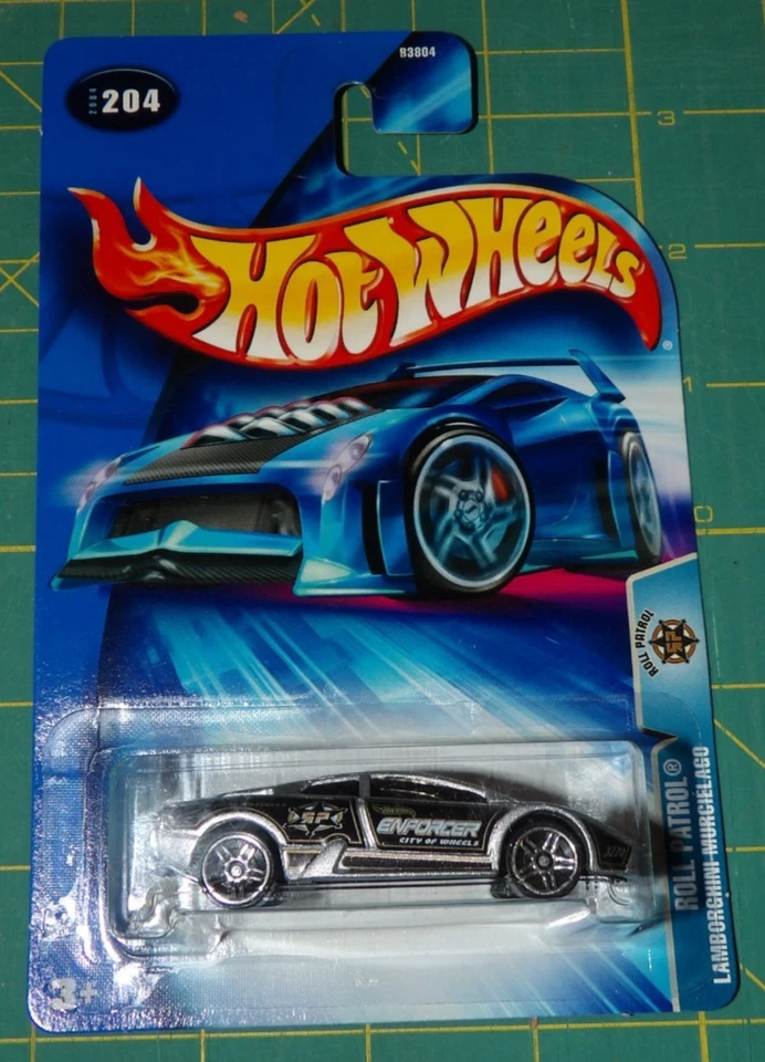2X - Hot Wheels Roll Patrol 2004 - Lamborghini Murcielago y caja de surf Foto 2 de 4