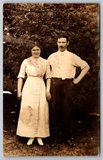 Couple man with Mustache Pocket watch Real Photo Postcard RPPC c1910s