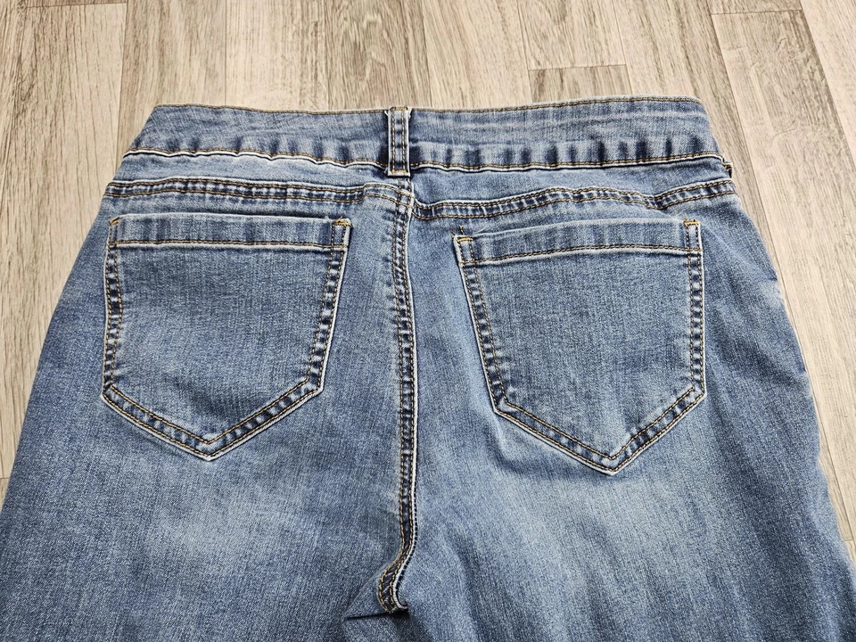 Pantalones de mezclilla Boom Boom de tiro bajo ajustados para mujer 7 botones elásticos desgastados Foto 3 de 4
