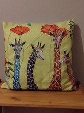 Unusual Coloured Giraffes and Poppies Cushion Yellowy-green Background