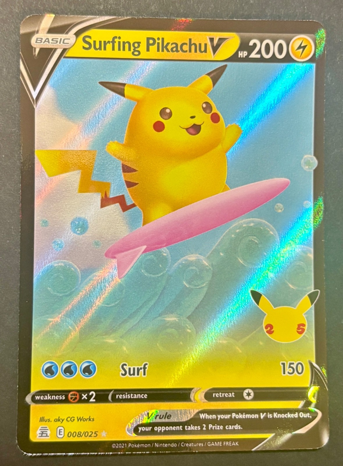 Pokemon TCG Surfing Pikachu V 008/025- Celebrations NM/M condition