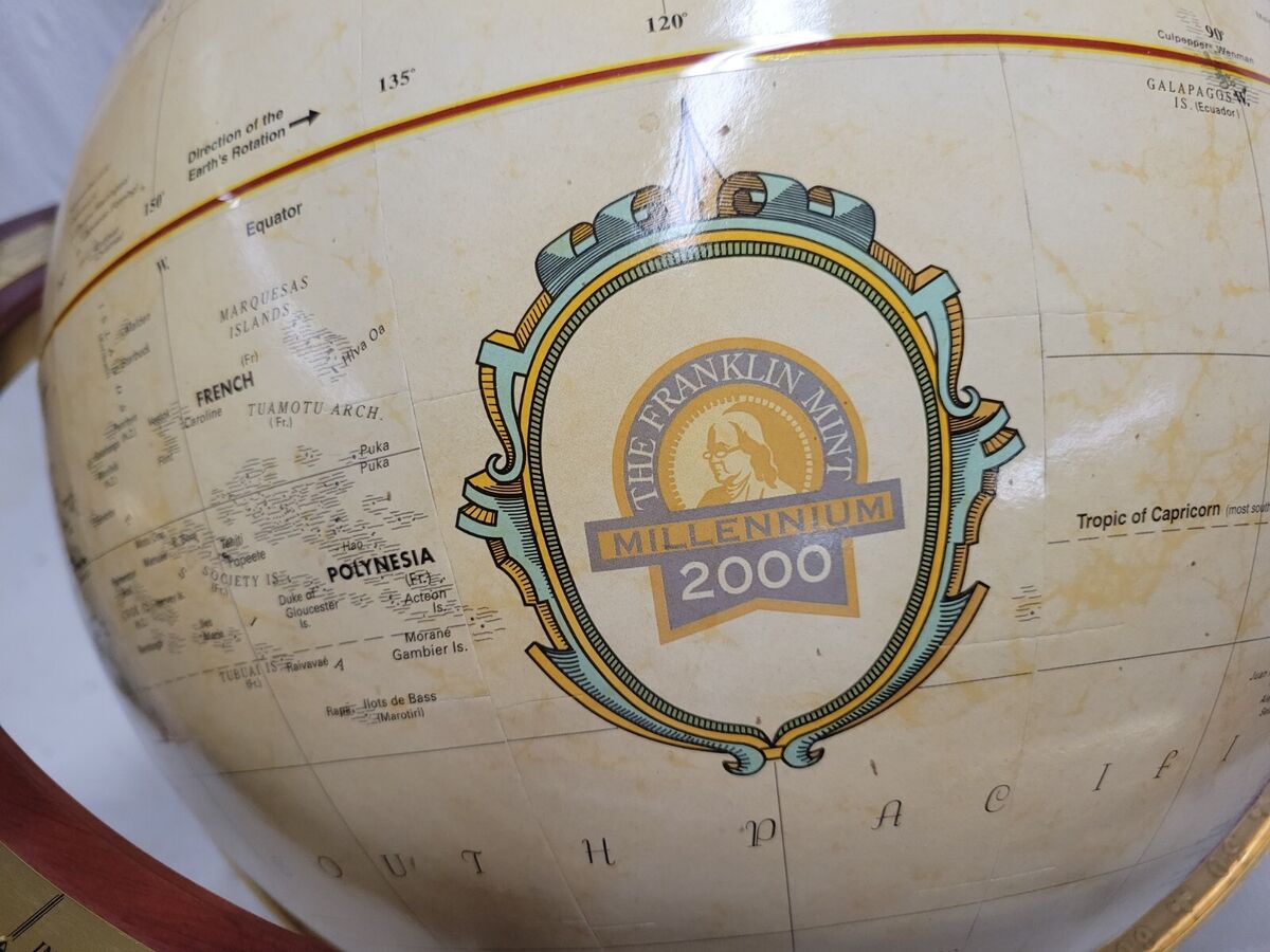 Sold at Auction: Royal geographical Society world globe on wooden