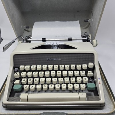1964 OLYMPIA DeLUXE SM7 Portable Typewriter w/ Case, Manual & Original Documents