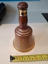 A ceramic bell-shaped bottle, vintage Bell's Old Scotch Whisky decanter