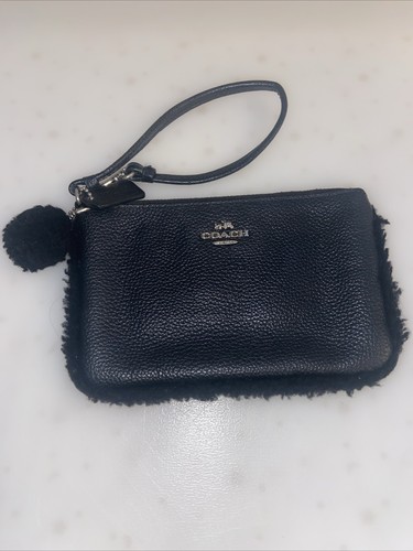 Coach Black Pebbled Leather Wristlet with Shearling Trim And Pom Pom