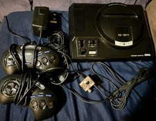 Sega Mega Drive console with power lead plus rf switch for tv and 2 controllers