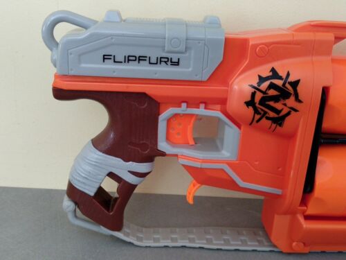 Pistola Nerf N-Strike Zombie Flipfury Naranja + 13 Dardos - Doble Cargador - Imagen 8 de 9