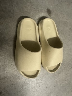Yeezy Slide Size 9, Can Fit Size 10 Also. Color Is Bone And Is Barely Used.