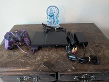 PS2 slim console bundle, with 1 controller and original cables. Clean & Tested.