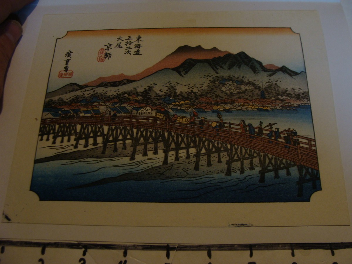 Vintage Japanese Woodblock Print: People traveling over bridge
