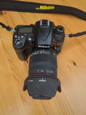Nikon d7000 camera with Sigma 18-200 lens in great working condition 