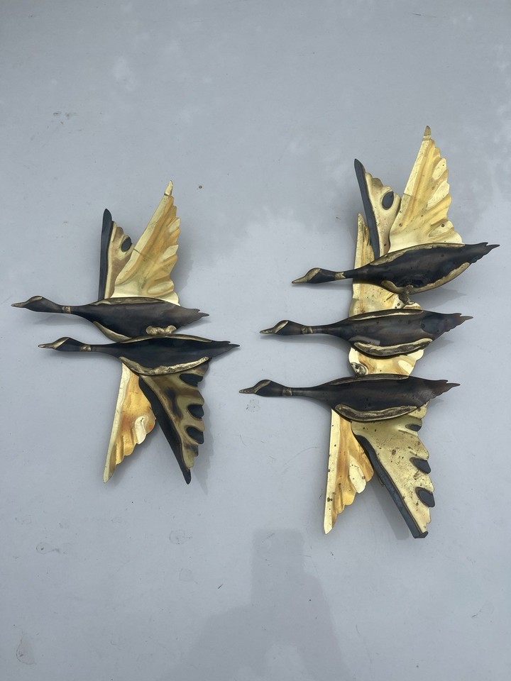 Actual vintage 1960s metal flying geese wall art — the kind of set your cool mid-century-obsessed aunt has and you've always wanted to steal.