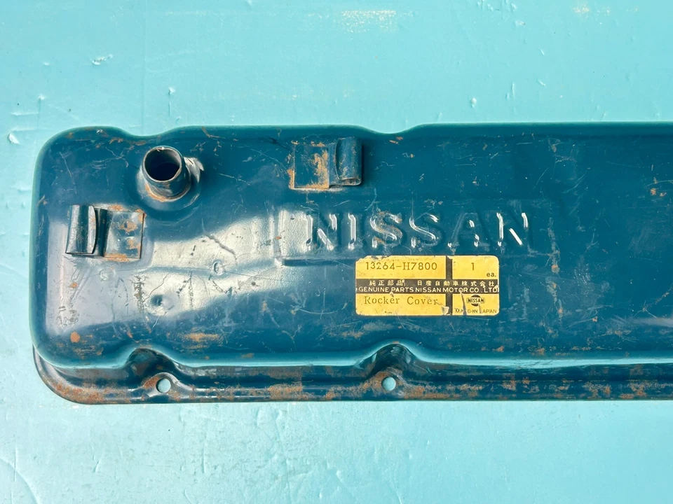 Cubierta de válvula basculante Nissan Datsun B120 B210 B310 13264-H7800 genuina nueva de stock Foto 2 de 4