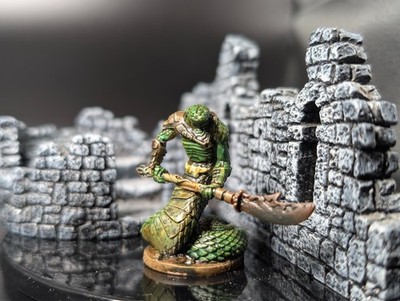 Well painted snake man warrior with pole arm d&d miniature