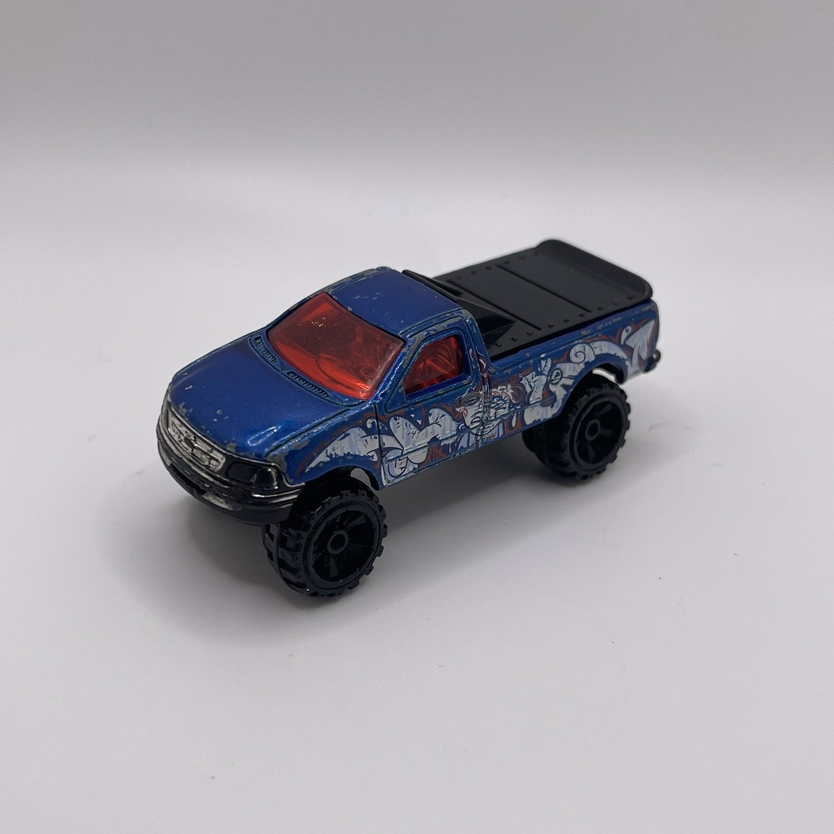 Hot Wheels - 1997 Ford F-150 Graffiti Lifted 4x4 Thailand Blue