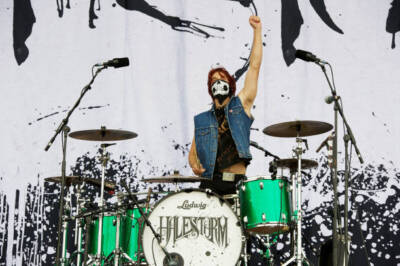 Drummer Arejay Hale of American hard rock group Halestorm live on - Old Photo