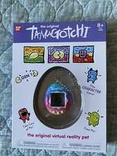 BRAND NEW WITH BOX THE ORIGINAL TAMAGOTCHI MULTI COLOR