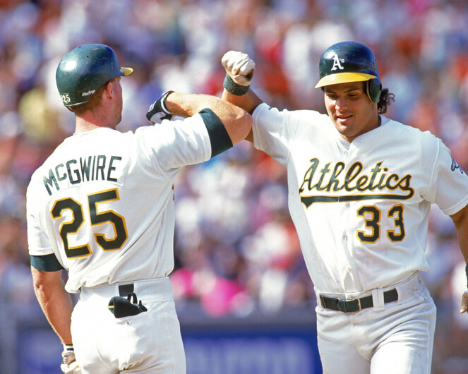 Oakland Athletics MARK MCGWIRE and JOSE CANSECO Glossy 8x10 Photo Bash Brothers