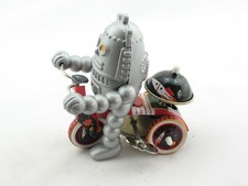 Blechspielzeug - Space Baby-Robot auf Dreirad...