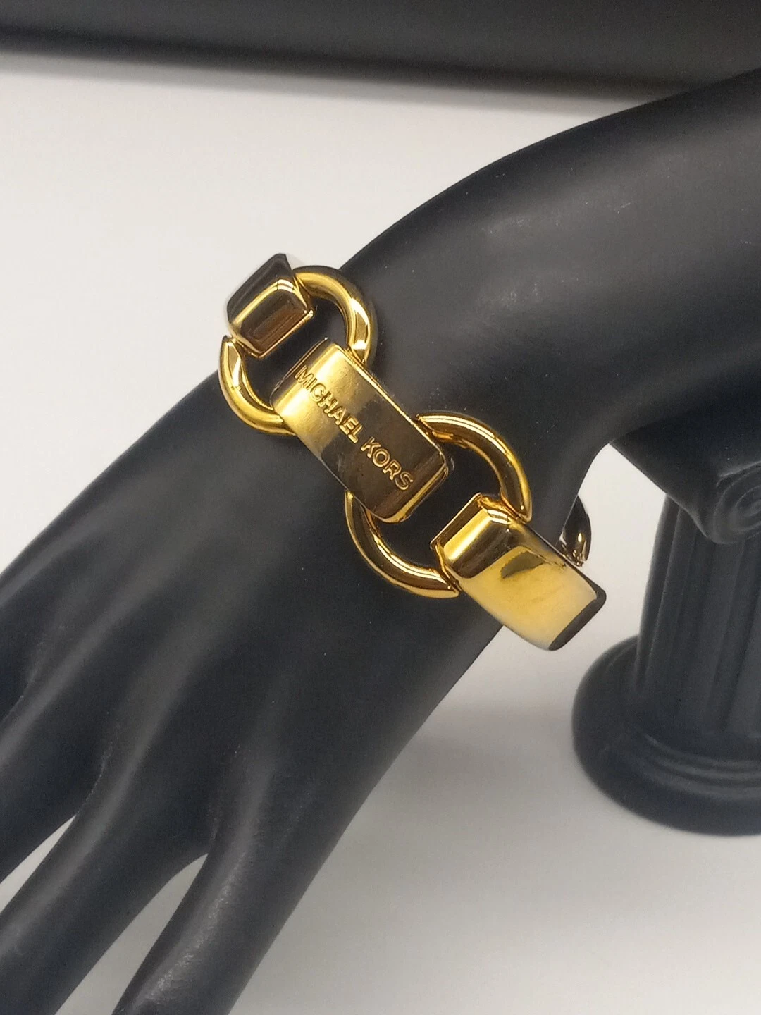 Bracciale Michael Kors 1 4" largo tono oro lucido grande maglia cerchio e barra