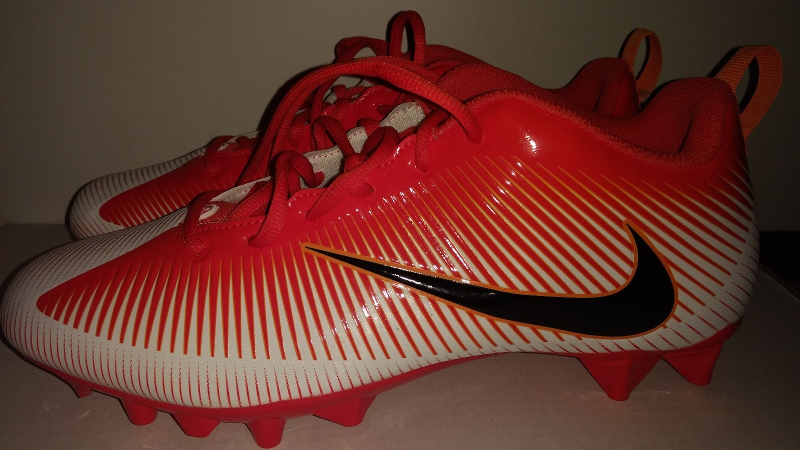 orange nike youth football cleats