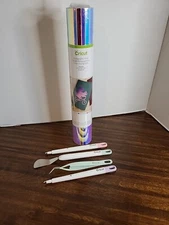 Cricut items include spatula, (new -holographic vinyl), stylus, etc... (#649)