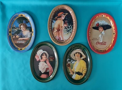 Collection of Reproduction Coca Cola Tip Trays (Various Years)