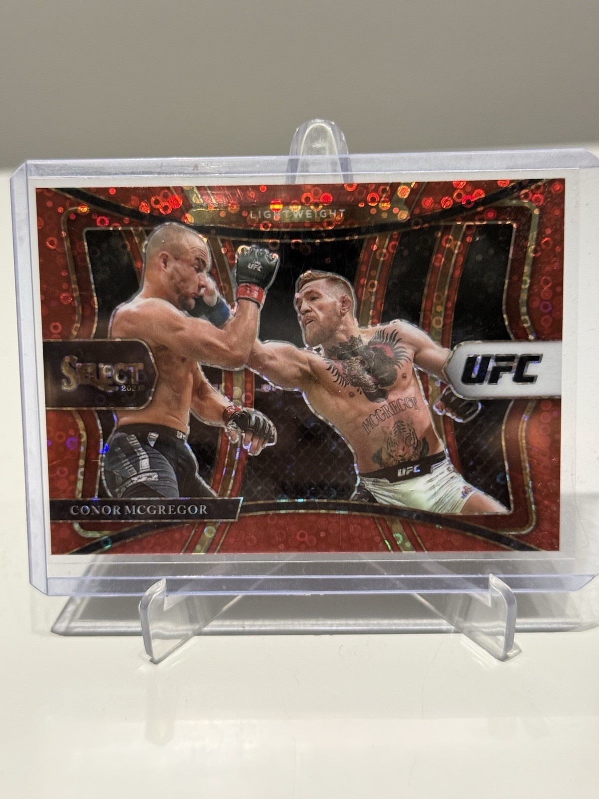 2021 Panini Select UFC - Premier Level Conor McGregor #199 Red Disco Prizm /199