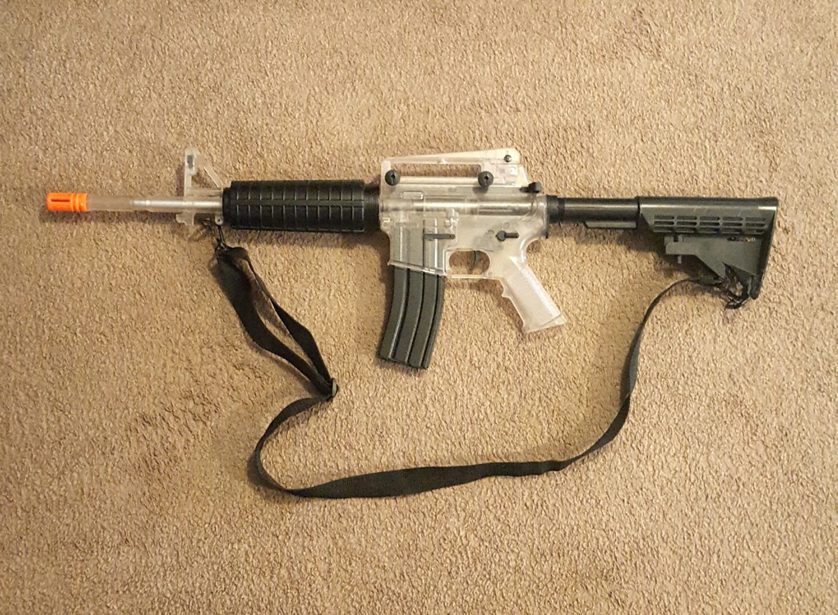 Colt M4A1 Airsoft Rifle Toy Cybergun With Magazine And Colt M4A1 Airsoft Rifle Toy Cybergun With Magazine And