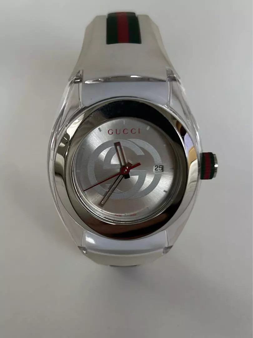 Montre femme GUCCI SYNC 137.3 d'occasion cadran argenté quartz ceinture caoutchouc
