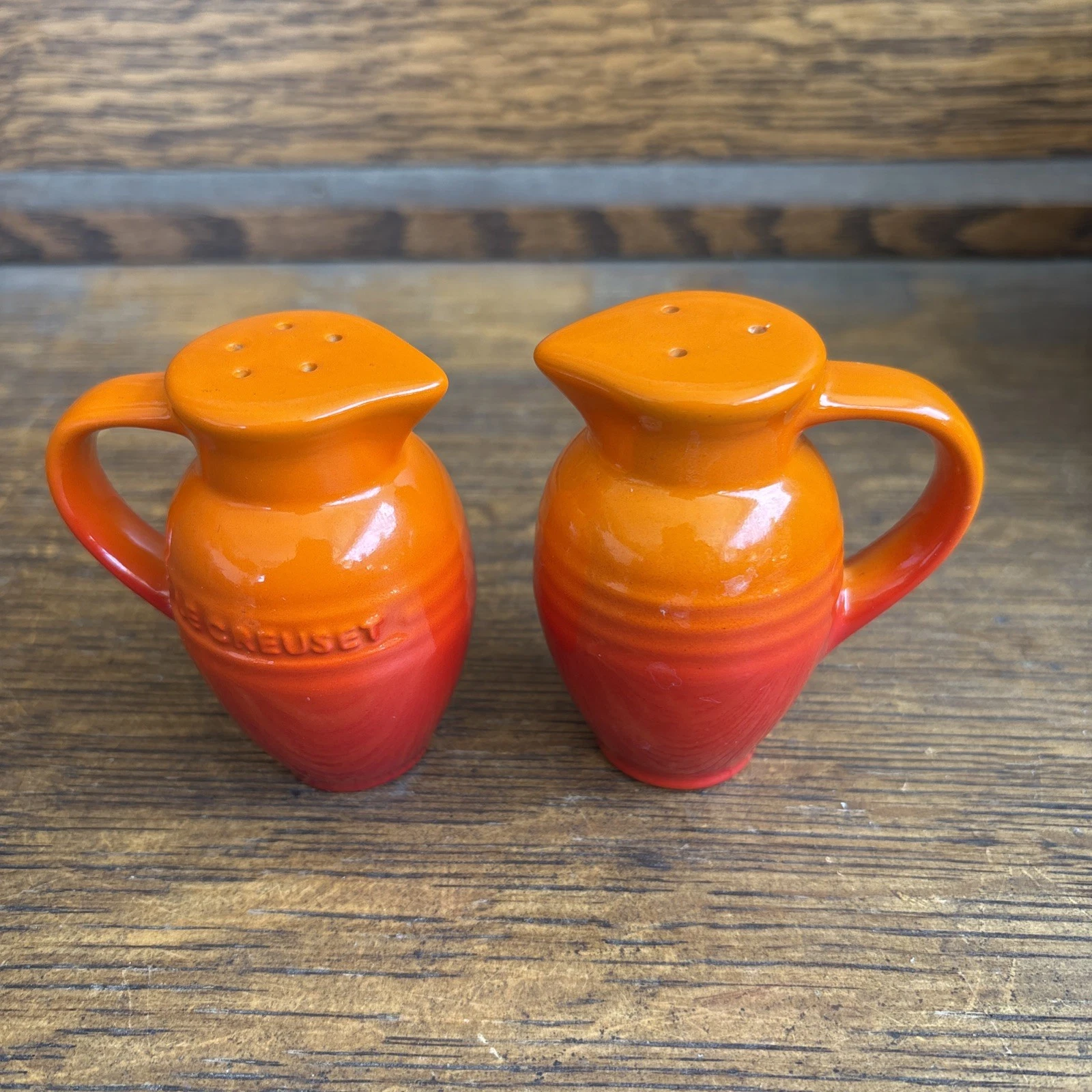 Le Creuset Salt & Pepper Shakers Pitcher Jug Style Flaming Orange Stoneware 3.5"