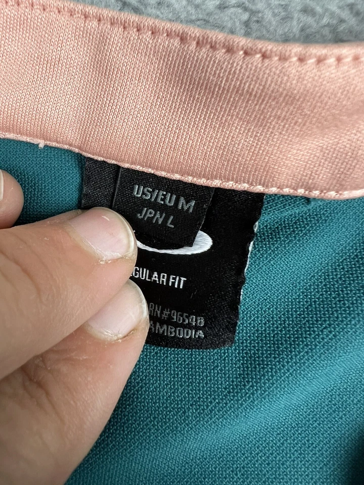 Camisa polo de golf Oakley para mujer mediana Bella azul verde azulado elástica deletreada Foto 3 de 4