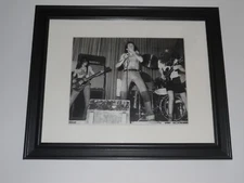 Framed AC/DC Bon Scott, Angus Young, Malcolm Young 1975 On Stage  14" by 17"