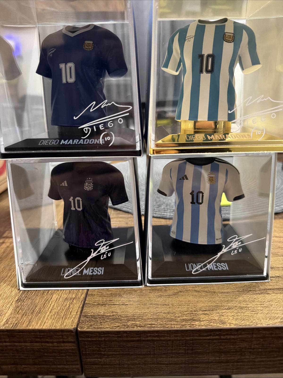 Gold Maradona. Maradona 1986 Away Blue, Messi 2022 Away Blue & Messi 2022 Home.
