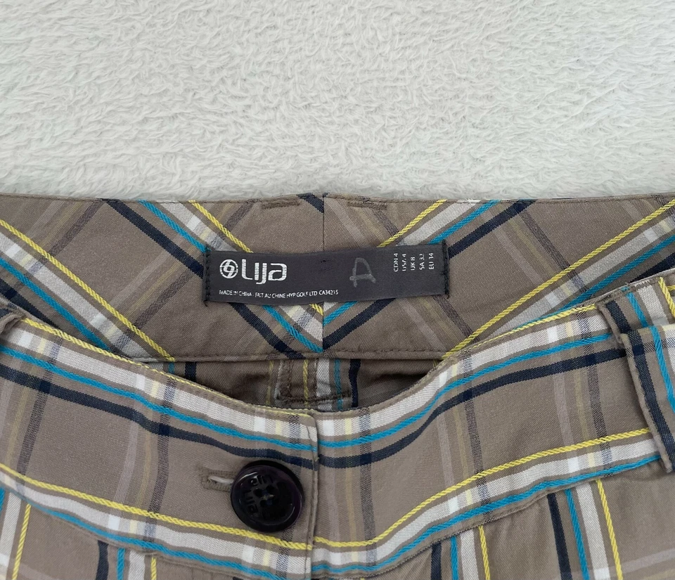 Pantalones cortos de golf Lija para mujer talla 4 tiro medio atléticos al aire libre frente plano hasta la rodilla Foto 2 de 4