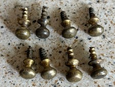 8 very small similar cabinet drawer pulls.