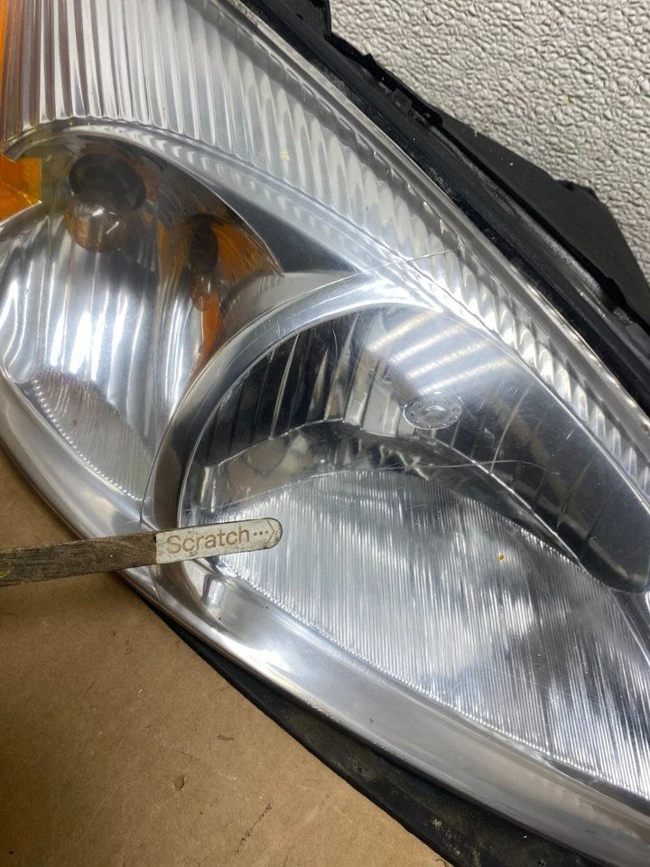 Juego de faros halógenos laterales izquierdo+derecho Ford Taurus 2000 a 2007 OEM V4827 DW Foto 4 de 4