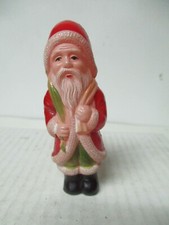 Vintage 4 Inch Tall Celluloid Christmas Santa Claus Holding Toy Sack