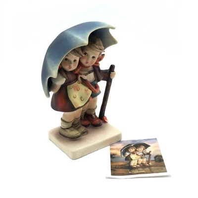 Figurine Hummel Goebel jeune fille parapluie n°71 sous un toit porcelaine 16 cm - Photo 1/4