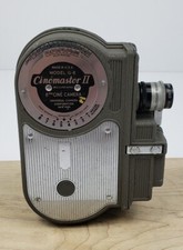 Cinemaster II Model G-8 8mm Film Cine Camera and Sylvania Sun Gun Movie Light