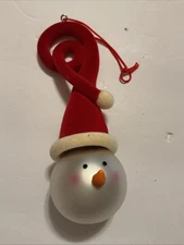 Snowman Head with Crazy Santa Hat Glass Christmas Ornament