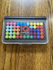 SmartGames IQ Puzzler Pro Compact Board Game Puzzle 120 3D Challenges