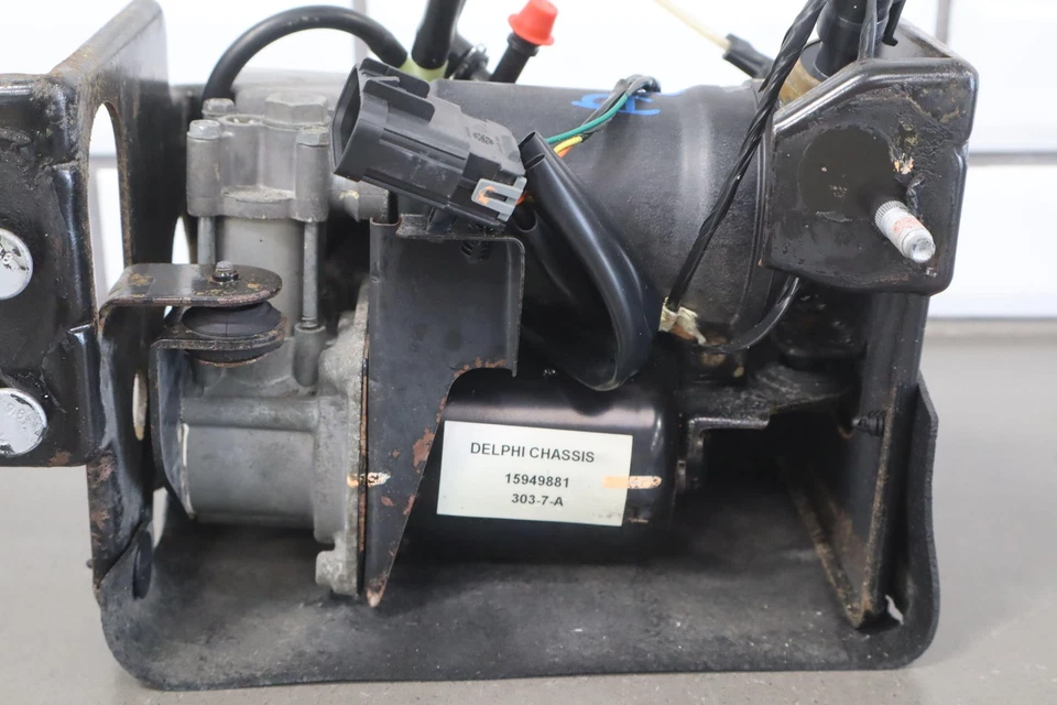 Compresor de aire nivelador automático Chevy Suburban 1500 07-14 Foto 3 de 4