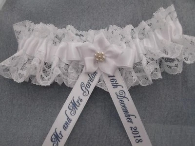PERSONALISED WHITE BRIDES WEDDING GARTER WITH A DASH OF BLUE - Image 1 of 3