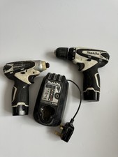 Makita, Model: DF330D and TD090D Two batteries, Charger See Description