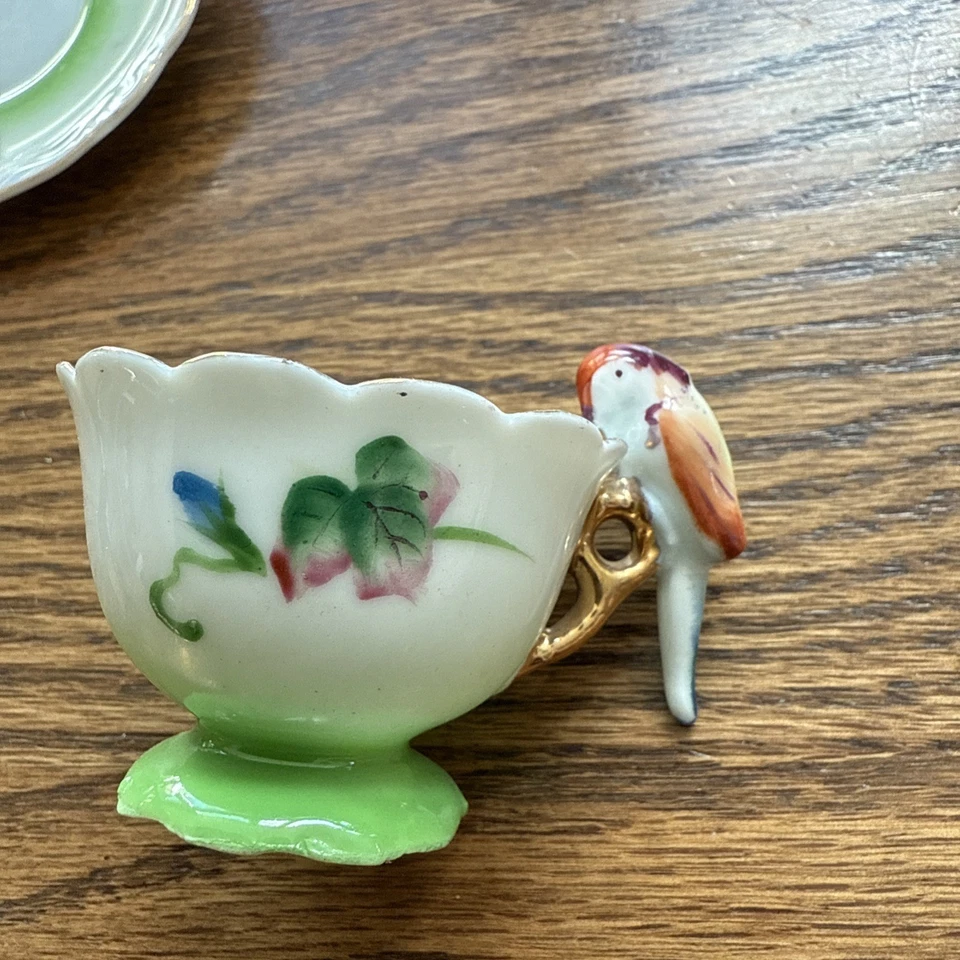 Taza y platillo miniatura con pájaros, flores, adornos dorados hechos en Japón Foto 3 de 4