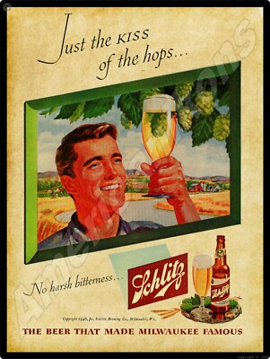 1946 Schlitz Beer New Metal Sign: ''Just the Kiss of Hops'' Made Milwaukee Famous!